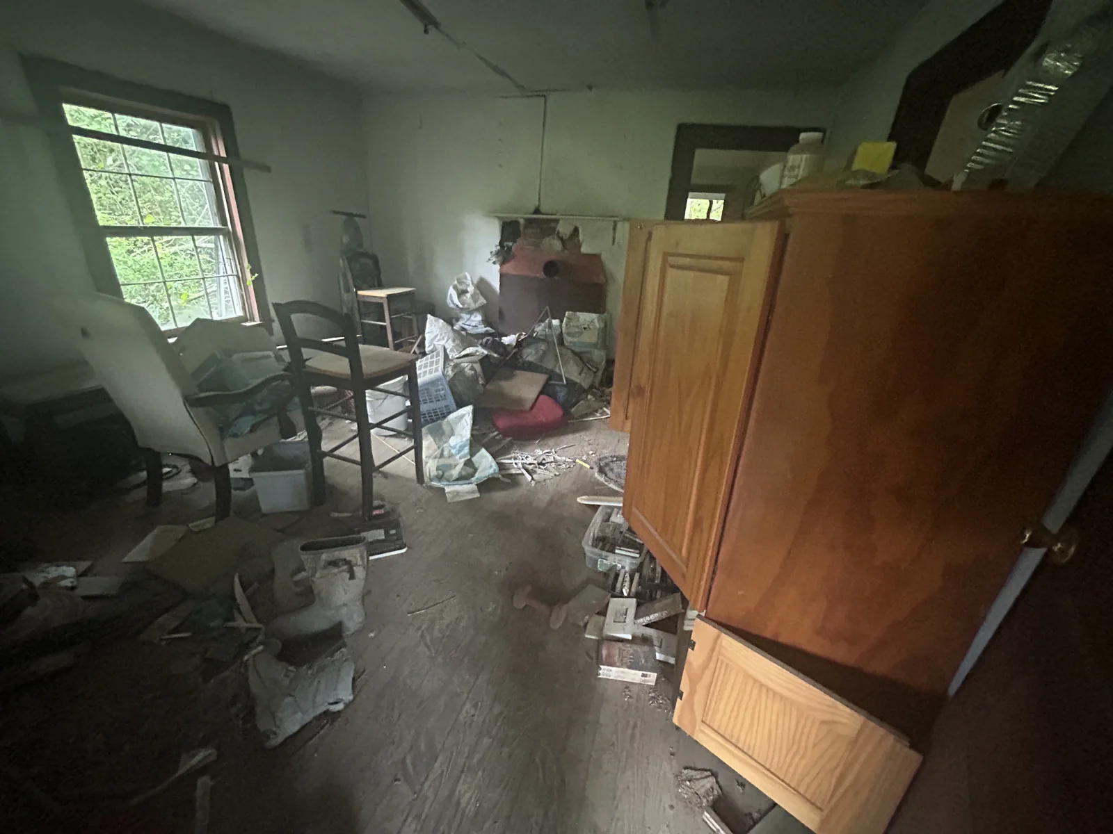 Furniture and household contents in a home before an ACG cleanout